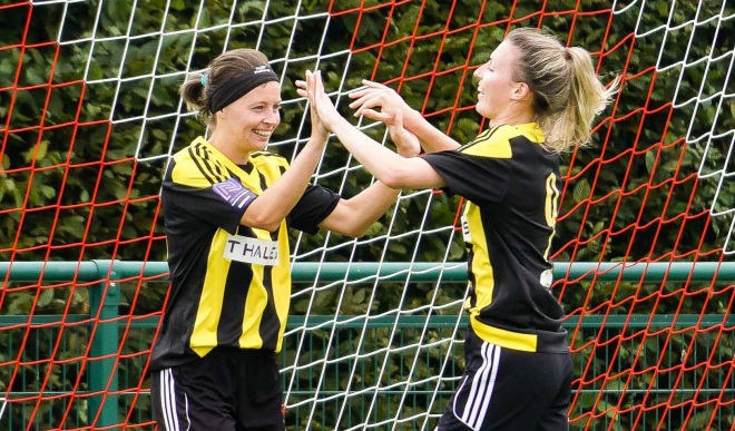 Faye Rabson and Sian Heather celebrate a goal against Ipswich Town on the opening day of the 2018/19 season (Photo: Ben Davidson)